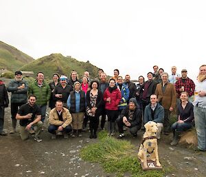 69th ANARE Summer team photo with a mannequin dog in the front