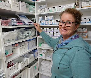 Doctor Jan Wallace undertaking stock control in the Macquarie Island Medical Facility
