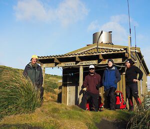 Macquarie Island expeditoners Wayne, Kerri, Emry and Andrea at Bauer Bay Hut