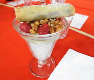 A pictures of a dessert with coconut sago, lime curd and coconut crumble, with chocolate spring roll by Macquarie Island Chef Nick Baker