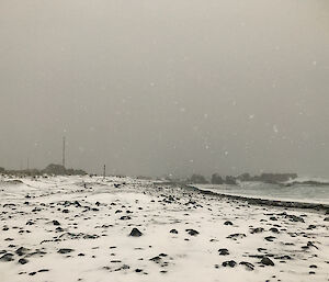 The coastline covered in snow.