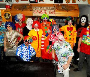 A group of people at a clown-themed birthday party.