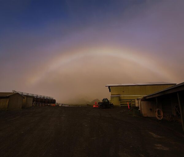 A rainbow that goes right over the Macquarie Island station.