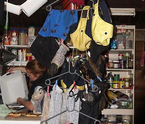 Clothes hanging in a chandelier type manner in the field hut getting dried out.