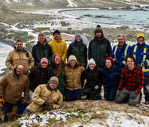 The full group of ANARE team pose for a photo.