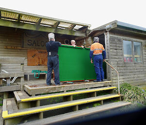 Moving a very awkward and heavy pool table out of the Macca mess