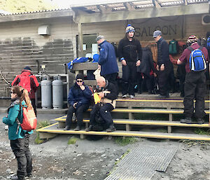 Tourists enjoy a visit to Macquarie Island station