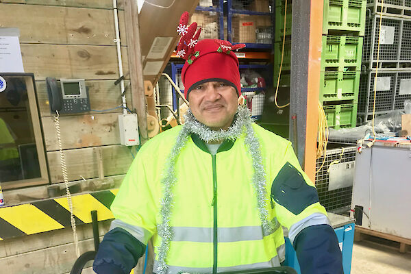 One of Santa’s Macca Elves (aka Cliff) preparing Christmas decorations.