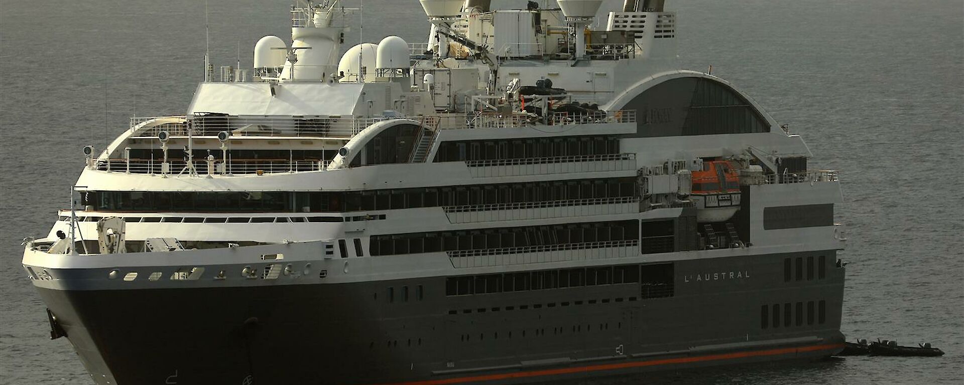 A large grey cruise ship.