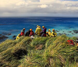 Macquarie Island expeditioners undertaking a SAR technical rescue exercise on the Doctor’s Track