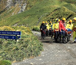 The rescue team returning to station with the stretcher.