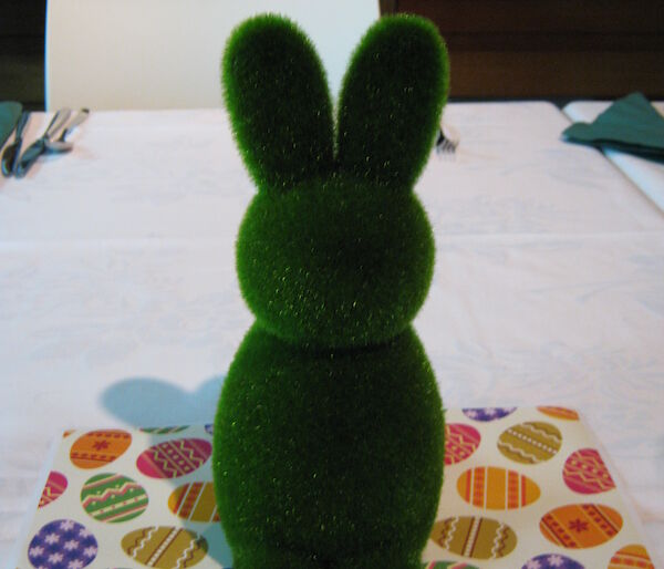 A green astro-turf bunny as a table centre piece for the Macquarie Island Easter dinner