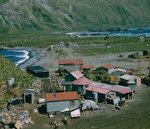 An early photo showing the Nissen Hut, but also the various other types of buildings ANARE used during different eras.