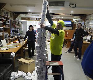A toilet roll tower constructed in one of the Macca Green Sponge games held over Midwinter