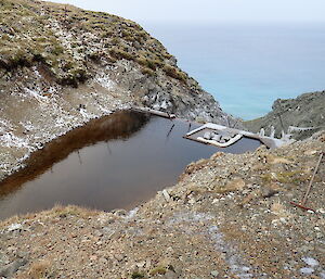 Looking down on Gadgets Dam on Macquarie Island