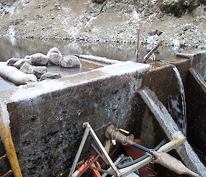 Gadgets Dam filled to overflowing on Macquarie Island