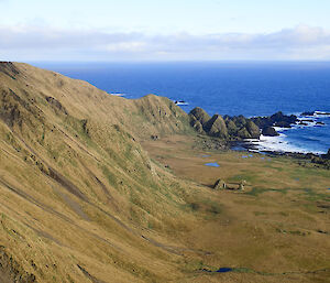 Looking out over Three Rocks to Aurora Point from the escarpment further south again from Bauer Bay on Macquarie Island