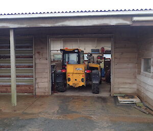 The station JCB parked in the garage at Macca