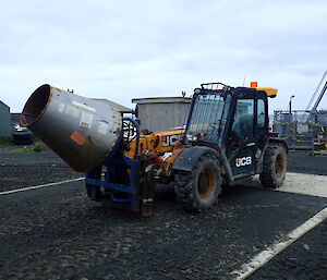 the station JCB with concrete mixer attachment