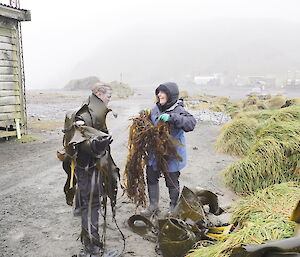 Ali helps Danielle into her Kelp monster costume on Macca for the 48 hour film festival