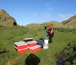 Greg Sandrey with the supplies put ashore near Waterfall Bay hut