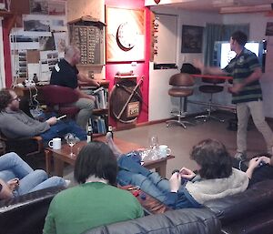 The Macca team watching relaxing and watching the darts in the recent inter-station darts tournament