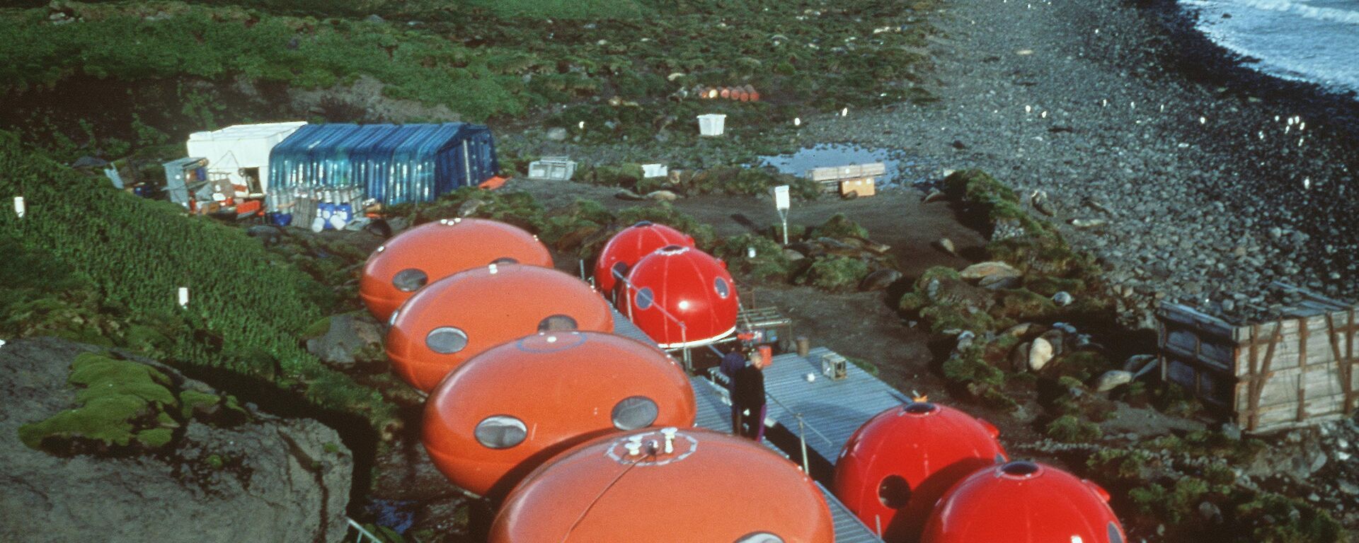 Four Googie huts and four apple huts at Spit Bay Winter Camp on Heard Island, 1993