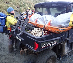 The stretcher containing Angus is strapped onto the back of the Polaris with Ranger Chris attending ready for transport back to station in a recent SAR training exercise on Macca recently