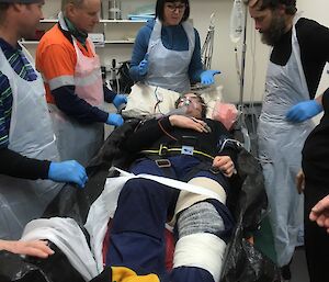 The training continues into the medical facility as Cathryn the doctor puts the lay surgical team through their paces with primary care for the patient in a recent SAR exercise on Macca