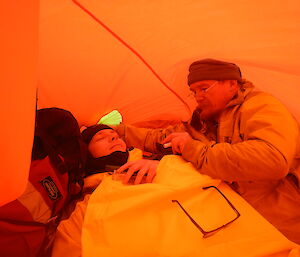 First responder Chris doing ‘obs’ on the patient Angus and relaying the information back to the Doctor on station by radio