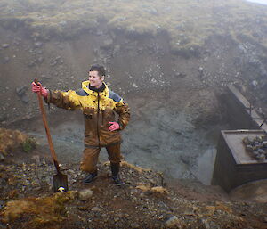 Danielle covered in mud in the now cleaned Gadgets Dam