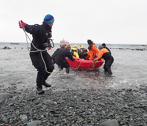 Danielle and the rest of the Macca shore crew secure the RIB and help to unload passengers