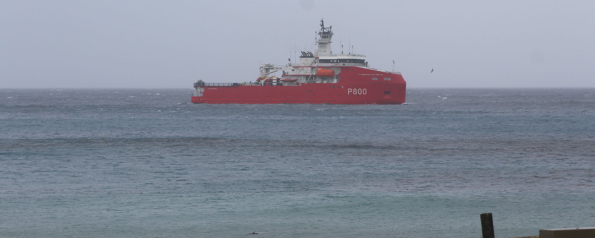 L'Astrolabe sailing past Garden Bay to take up position in Buckles Bay ready for passenger and cargo transfers