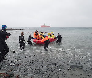 RIB delivers the second boatload of passengers safely ashore