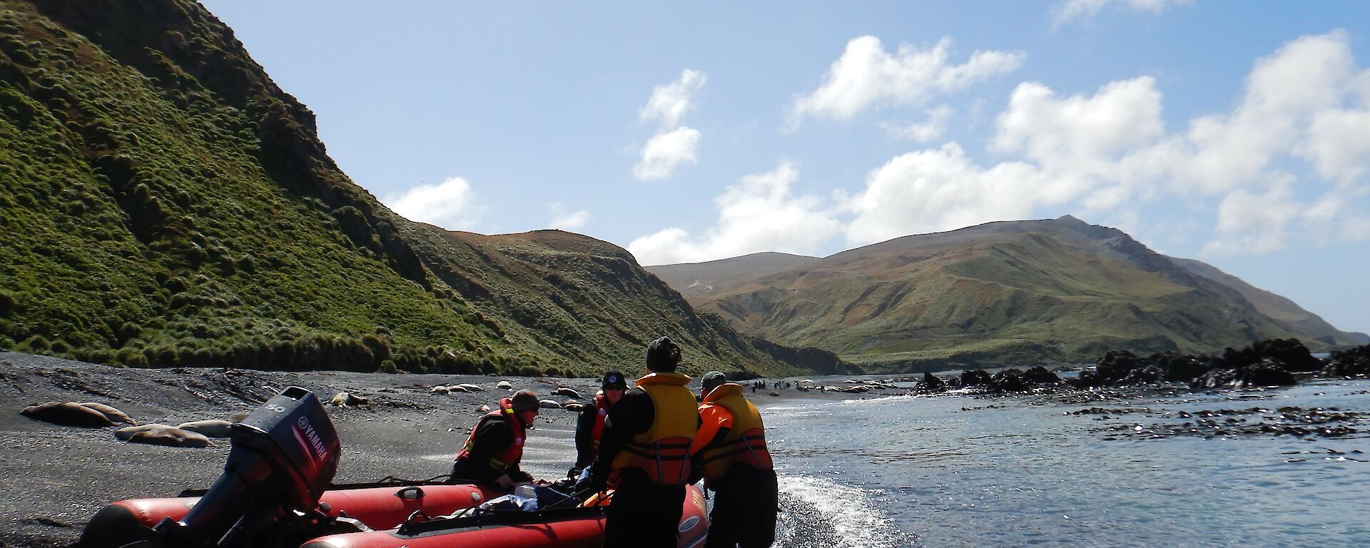 Stu, Cathryn, Angus and Chris dragging the boat around to launch from Brothers Point