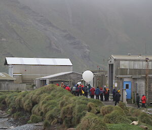 Balloon and sonde taken out of the balloon release building — tourists from the Professor Khromov/Spirit of Enderby watching