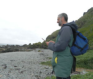 summer ranger Luke conducting the gentoo penguin chick count on Macquarie Island this week