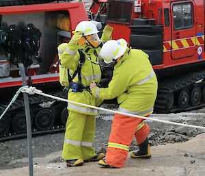 Firefighter checking breathing apparatus