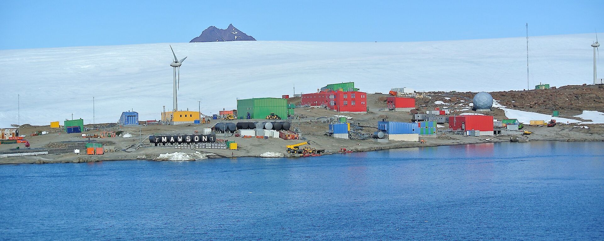 A picture of Mawson station taken from the water