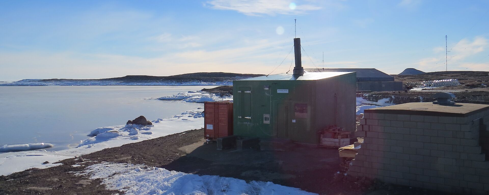 The incinerator building where Warren lives down by the shore