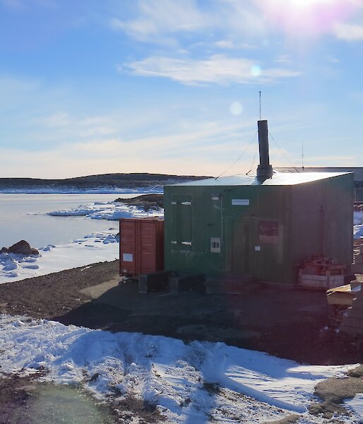 The incinerator building where Warren lives down by the shore