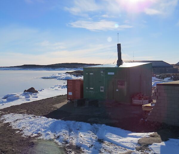 The incinerator building where Warren lives down by the shore