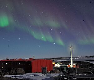 The Aurora is seen dancing over the liveing quarters