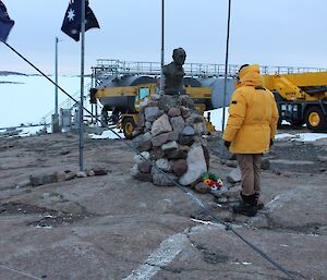 The wreath is laid at the flagpoles