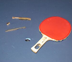 A broken ping pong paddle