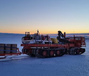 Above Mawson station at GWAMM with the sun setting in the background almost home