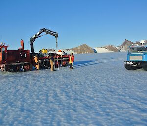 Poles being removed with the North Masson Ranges in the background