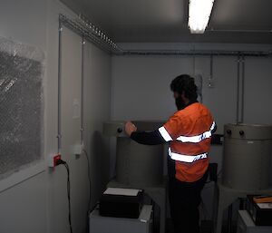 Trevor loading a sample in the detector