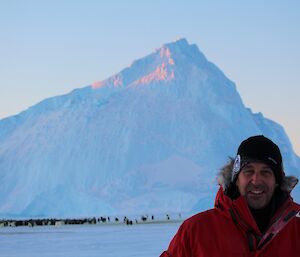 Kim with the penguin colony in the back ground