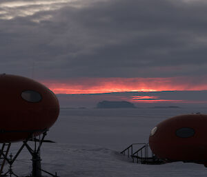 Sunset over the huts which are called melons